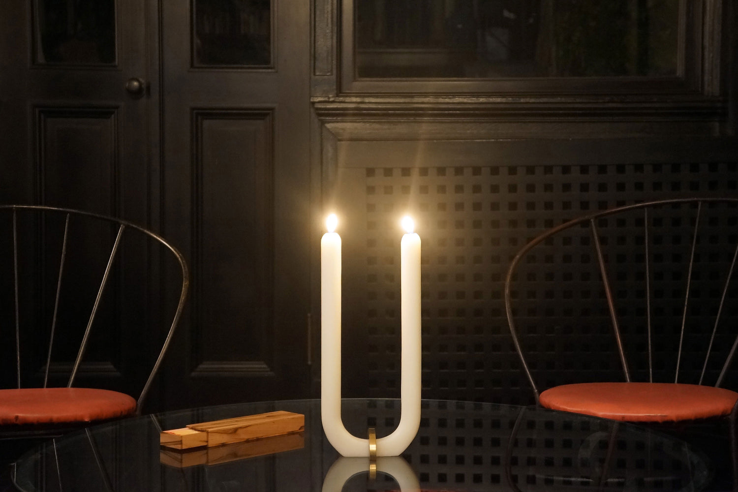 u candle on table